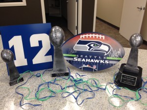 Our Lombardi-style trophies in our showroom are ready for a Seahawks win!