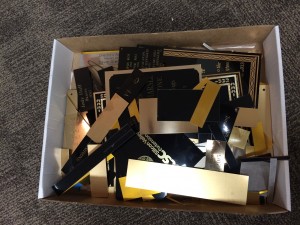 Our engraver Mike's box of brass scraps bound for recycling.
