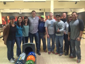 Trophies2Go staff bowling with beers.